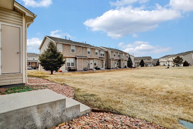 Building Photo - Spacious 3-Bed End-Unit Townhome with Mountain Views Near Ft. Carson