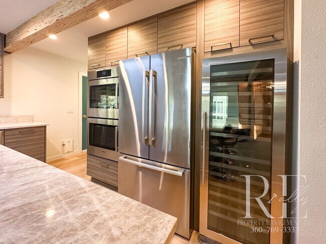 Building Photo - Mid-Century Modern Dream Home with Chef’s ...