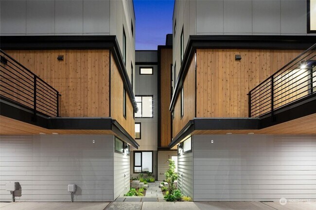 Building Photo - Welcome Home -Modern and Expansive Windows