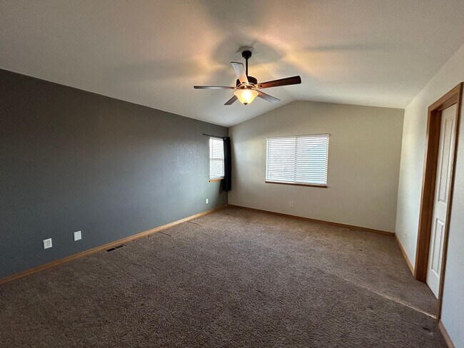 Building Photo - Spacious 5-Bedroom Home with Finished Basement and 3-Car Garage in Wellington