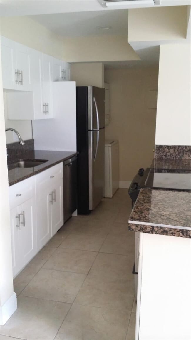 Building Photo - 8877 NW 28th Dr