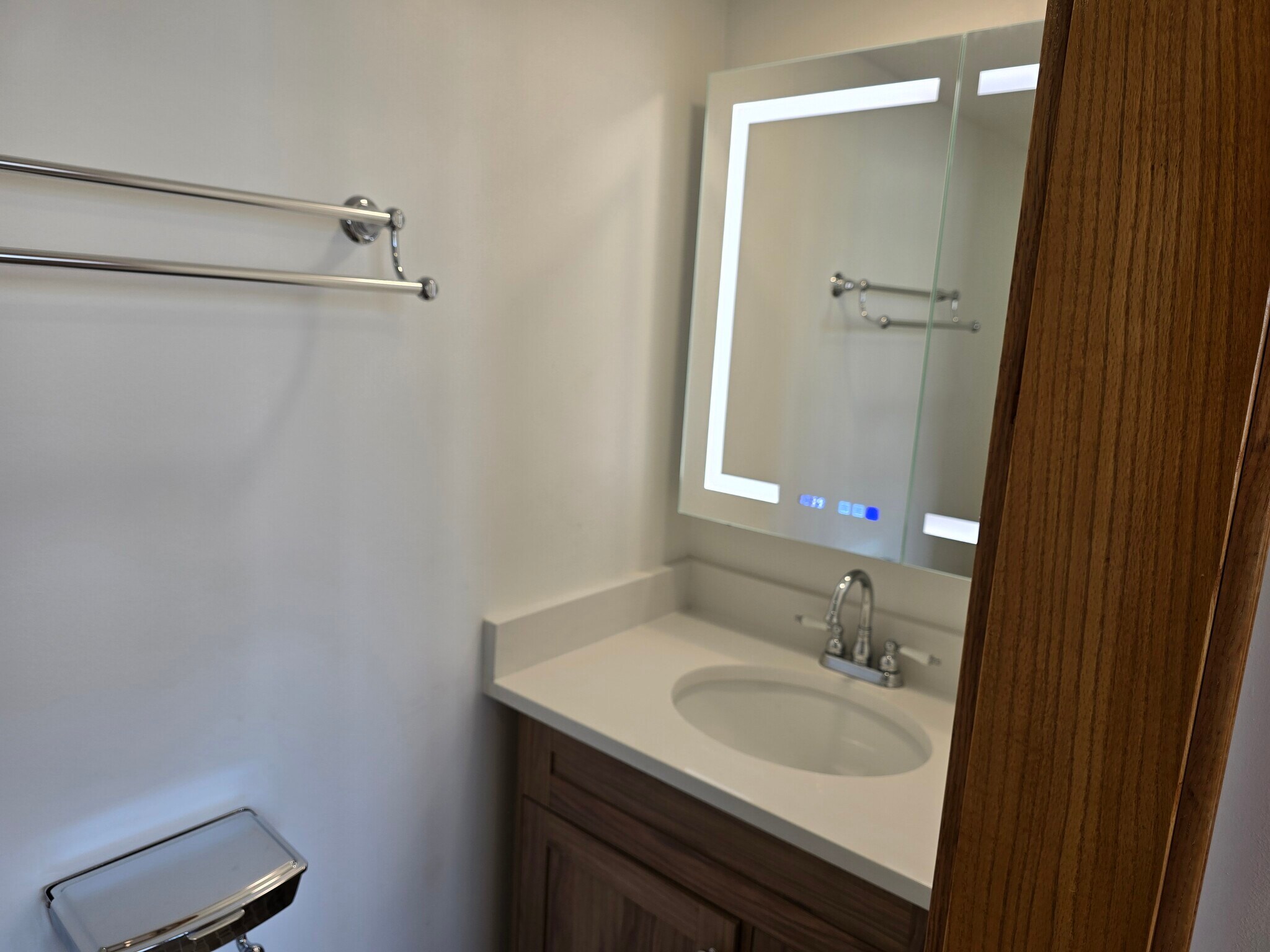 Master bedroom half bath with heated & lighted mirror - 1204 N Kedzie Ave