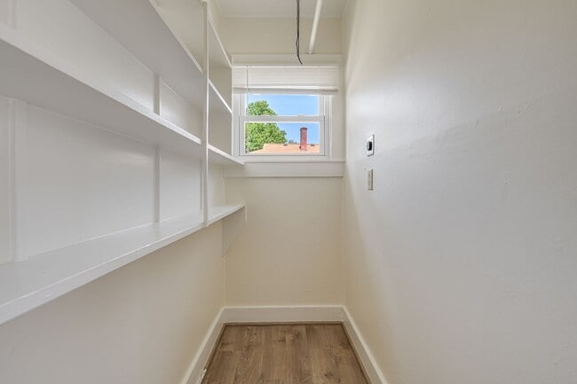 Building Photo - Charming 1930s Shotgun Duplex – Updated Bath, Walk-In Pantry, Water Included