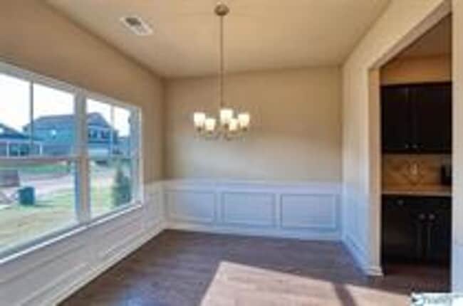 Building Photo - COMING SOON! Welcome to the Carlyle—where classic brick farmhouse charm meets a sleek, modern lif...