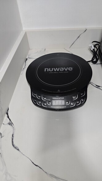 Induction cook top - 19353 SW 103rd Ct