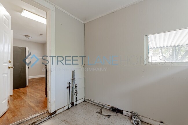 Building Photo - REDUCED! - NOW OFFERING HALF OFF FIRST FUL...