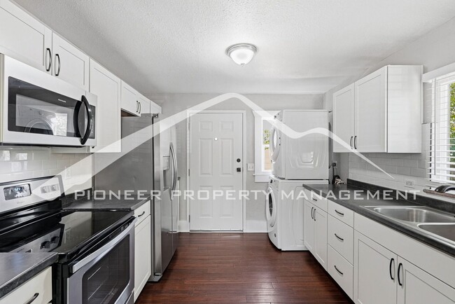 Building Photo - Spacious Home with 2 Kitchens and Central AC