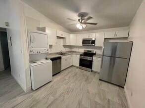 Building Photo - 6832 Tiki Ln