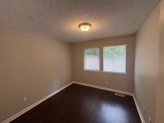 Building Photo - Four Bedroom Townhome Available Now