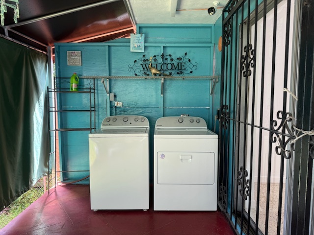 Washer/Dryer in backyard covered porch - 2477 SW 16th St