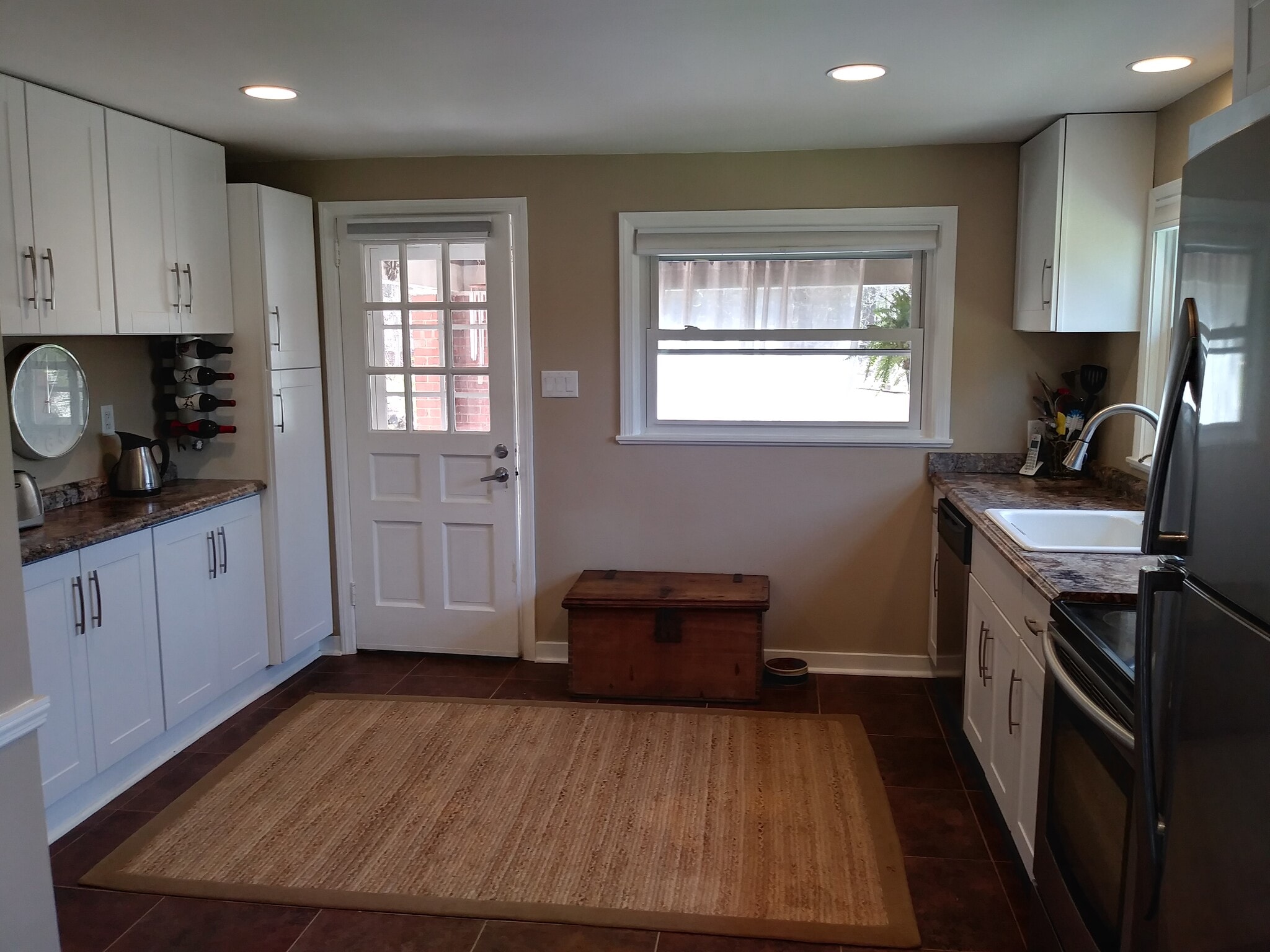 Kitchen view to covered porch. - 117 Fern Hollow Rd