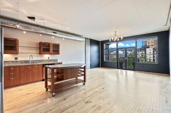 Building Photo - Elizabeth Lofts - 7th floor west facing Pearl District studio w/parking/concierge/most utilities