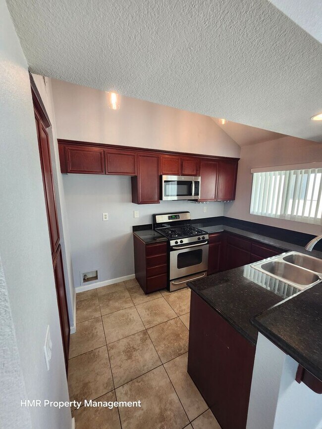 Building Photo - AVAILABLE NOW! Ontario Apt. in a gated community