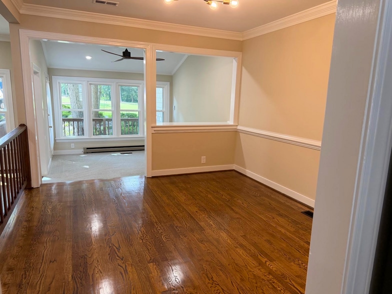 Dining room and sun room - 4 Muirfield Green Ln