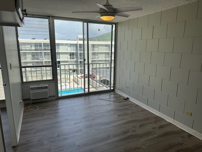 Building Photo - Sunny 2-Bed in Honolulu with Pool, BBQ Area, and Covered Parking - Close to UH-Manoa