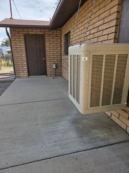 Personal washer and dryer located at the back of the apartment and cooled with a evaporative cooler - 610 N Orchard Ave