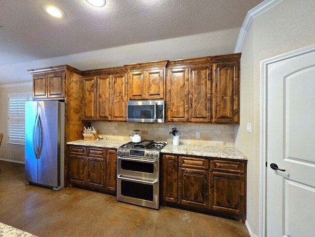 Building Photo - 6000 Rio Grande Ave