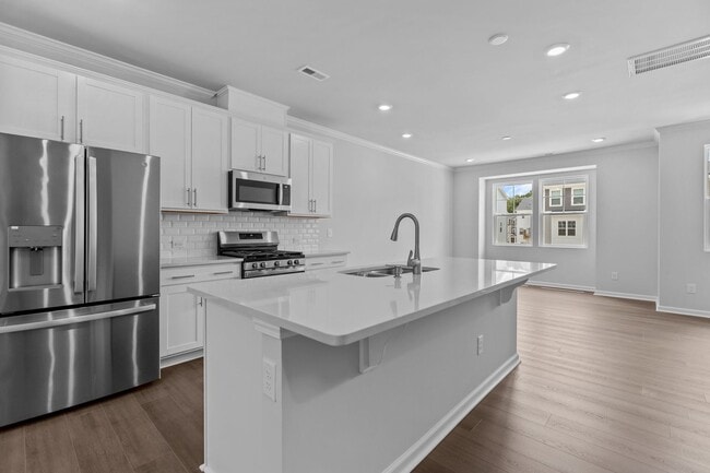 Building Photo - Gorgeous New Construction! Updated Kitchen...