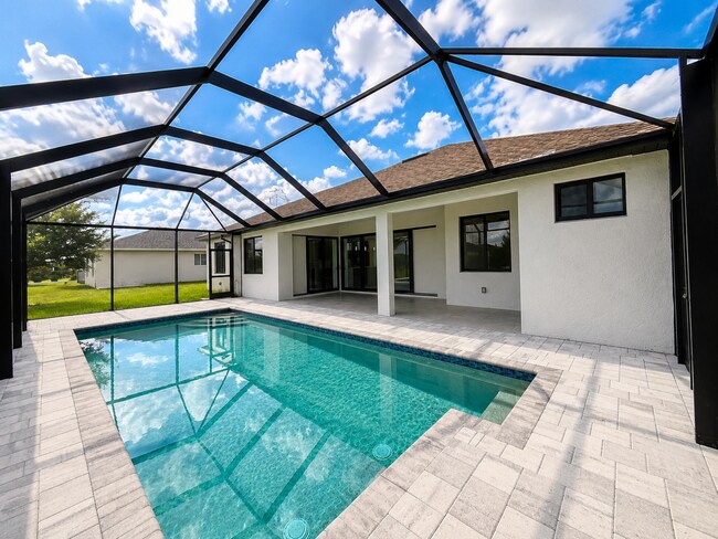 Building Photo - Move In Special! Pool Home with Canal View