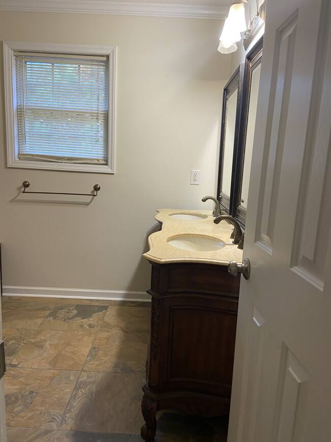 Main bath entry from primary bedroom - 1309 Ujamaa Dr