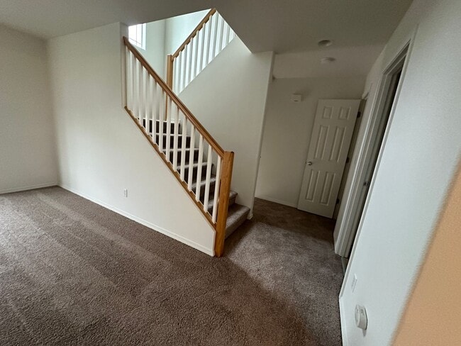 Building Photo - MOVE IN SPECIAL! Spacious 2 bed/2.5 bath with bonus room townhome off Road 68