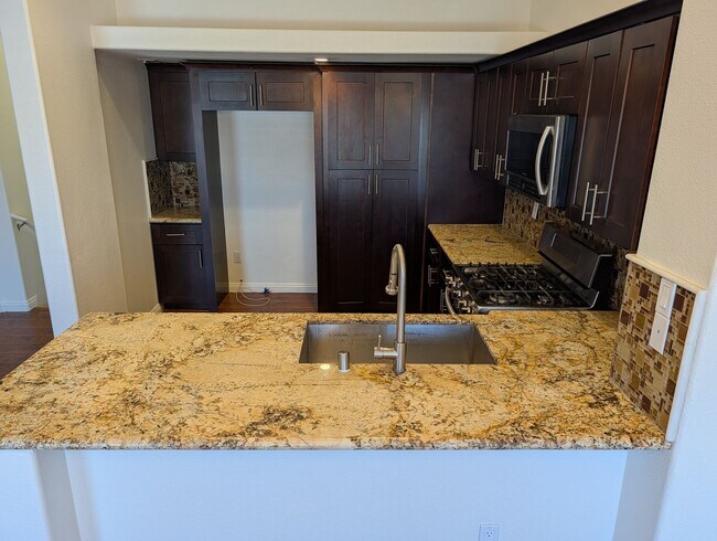 Building Photo - INVITING CONDO WITH OPEN FLOOR PLAN IN NORTHEAST LAS VEGAS