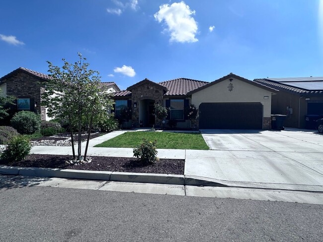 Building Photo - SE Visalia home coming soon! Equipped w/ Solar & Tesla charger