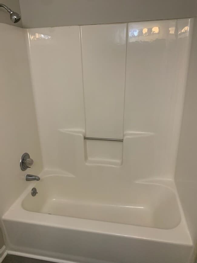 Building Photo - This charming 3-bed, 2.5-bath townhome is available for rent.