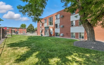 Building Photo - Beautifully Renovated 3 Bedroom Apartment with Private Balcony, In-Unit Laundry & A/C