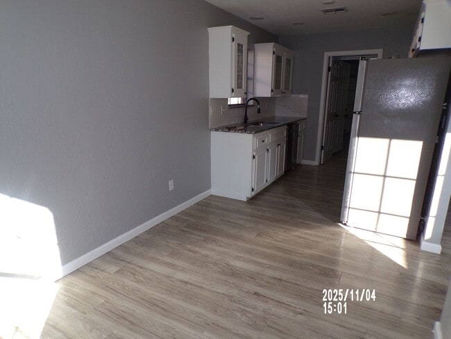 Building Photo - Fresh Paint!!, New Flooring and Granite Co...