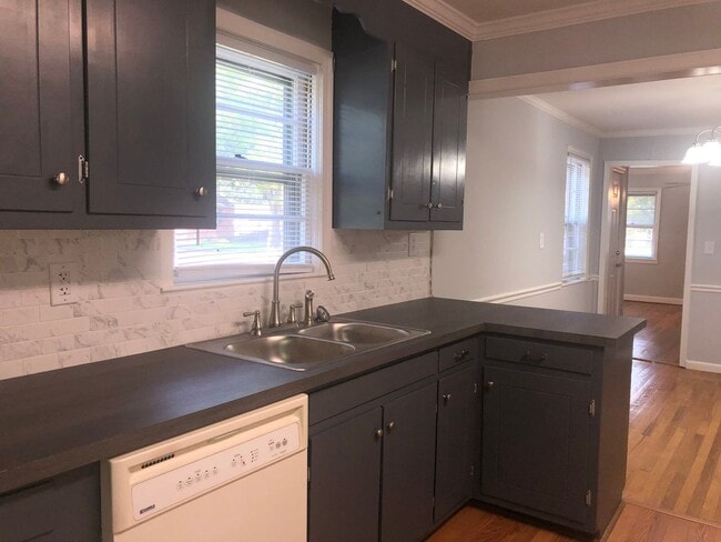 Building Photo - Updated Brick Ranch Conveniently Located