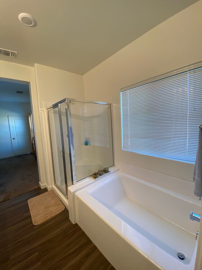 Building Photo - Welcome to the Best Deal in Town. Fully furnished 4 BD 2 BA house on a corner lot