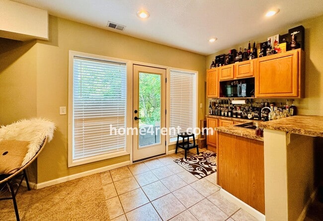 Building Photo - Beautiful Four Bedroom Home in a Quiet Neighborhood w/ an Updated Kitchen, Wood Floors, and a Fin...