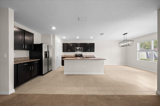 Building Photo - Move-In Ready! Beautiful 4-Bedroom Home with Modern Finishes & Room to Grow