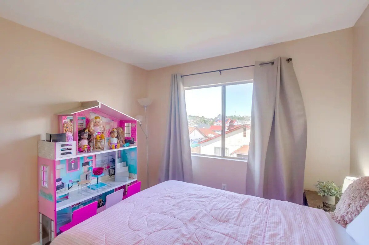 The star of this room is undoubtedly the large dollhouse, perfect for playtime - 6434 Bullock Dr