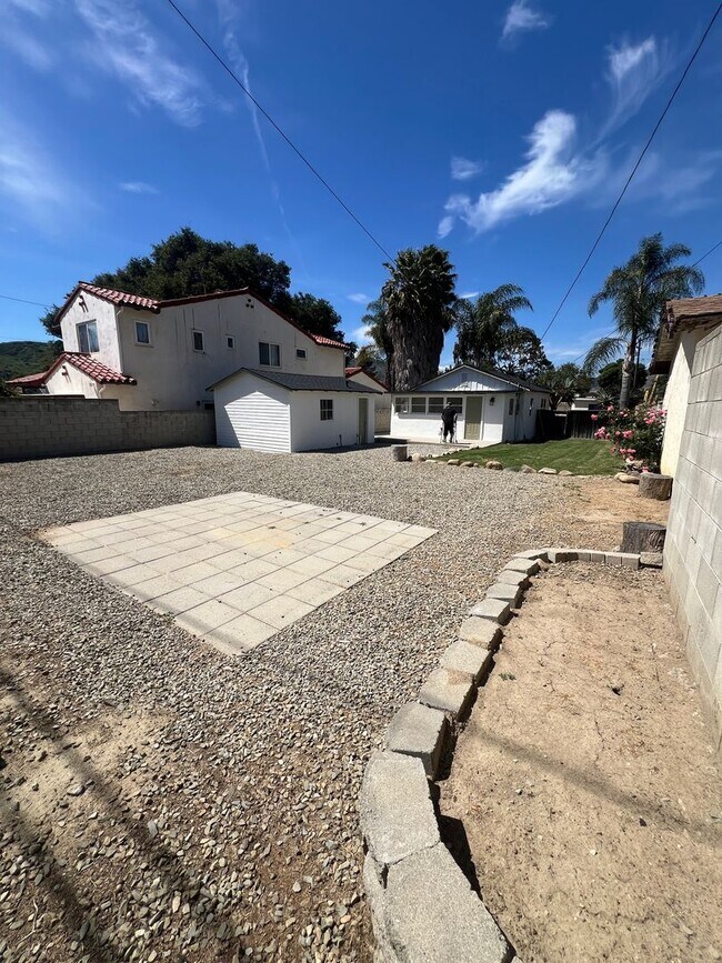 Building Photo - CHARMING! Remodeled 2 Bedroom home with storage and yard