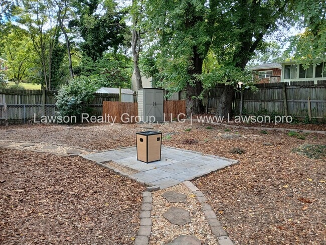 Building Photo - Charming Brick Ranch with Beautifully Land...