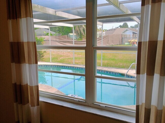 Building Photo - Pool. Privacy. Perfect location. Available...