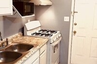 Building Photo - Airport Apartments