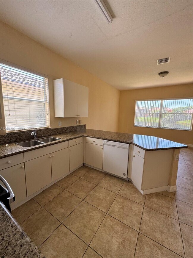 Building Photo - 12860 SW 51st St