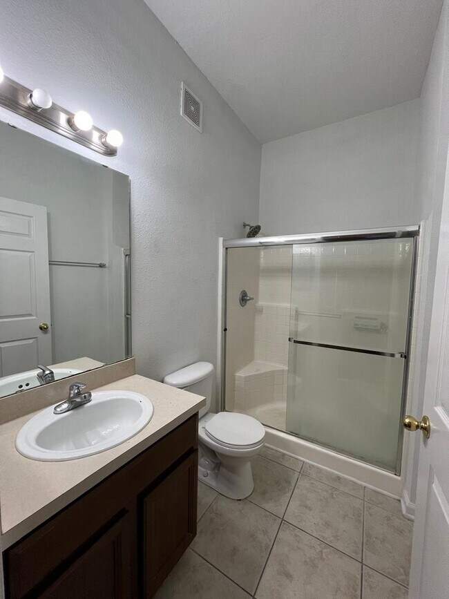 Building Photo - Spacious 3 bedroom condo located in a gated community off of Beach Boulevard