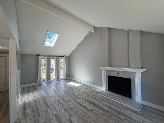 Building Photo - Spacious 4BR/3BA Home with Deck, Fenced Yard & Garage