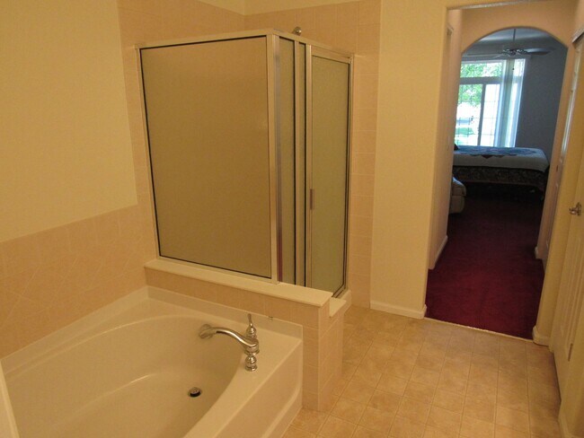 Building Photo - Ranch living in this Spacious Townhome in ...