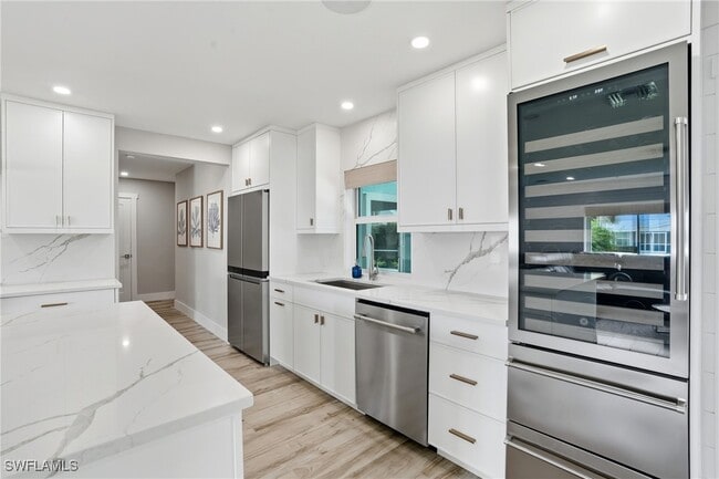 Building Photo - 6163 Plumosa Ave