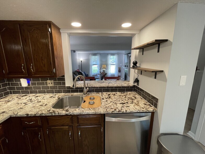 Kitchen with beautiful granite counter tops and real tile backsplash - 4204 Whistler Ct