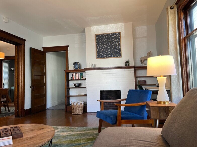 Living room mantel and bookshelves (from couch) - 28 Saint James Pl