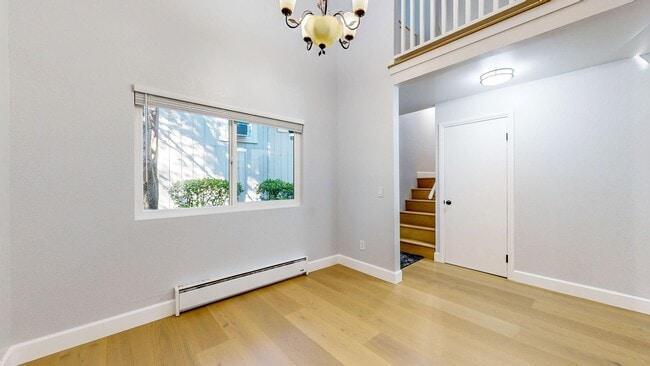 Building Photo - Cozy 2 Bedroom 1.5 Bath with Private Yard and Two Car Garage !