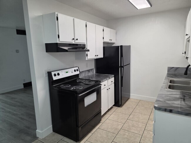 Building Photo - 1455 W Layton 4-plex