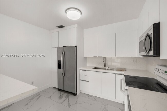Building Photo - 1284 W 44th Pl