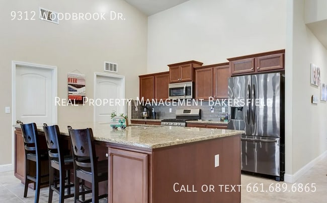 Building Photo - 9312 Woodbrook Dr